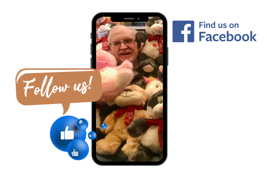 A phone with an elderly male surrounded by stuffed animals.