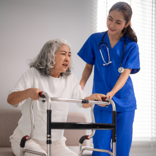 A caregiver giving assistance with daily tasks to a patient.